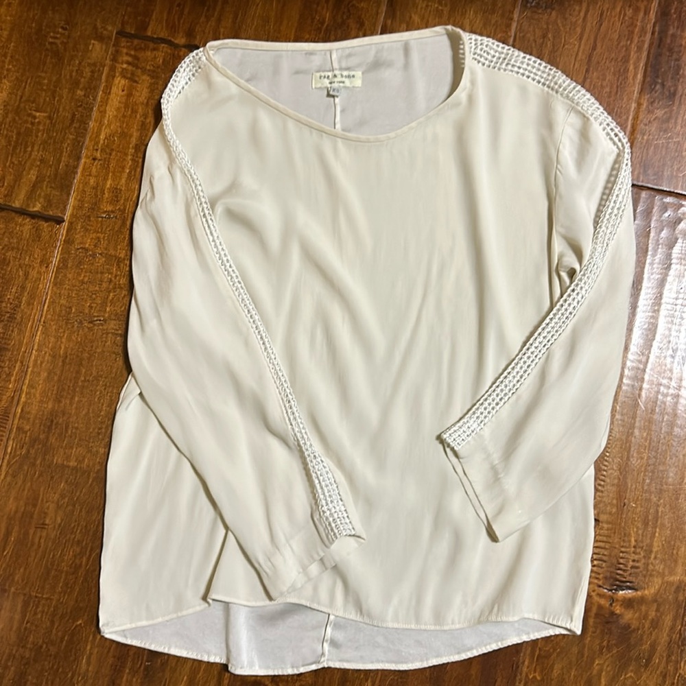 Rag and bone silky top with arm detail.